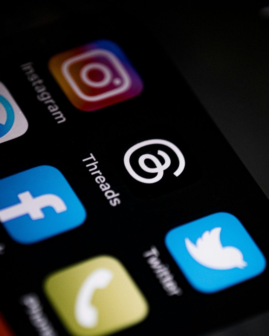 Social media app icons on a phone